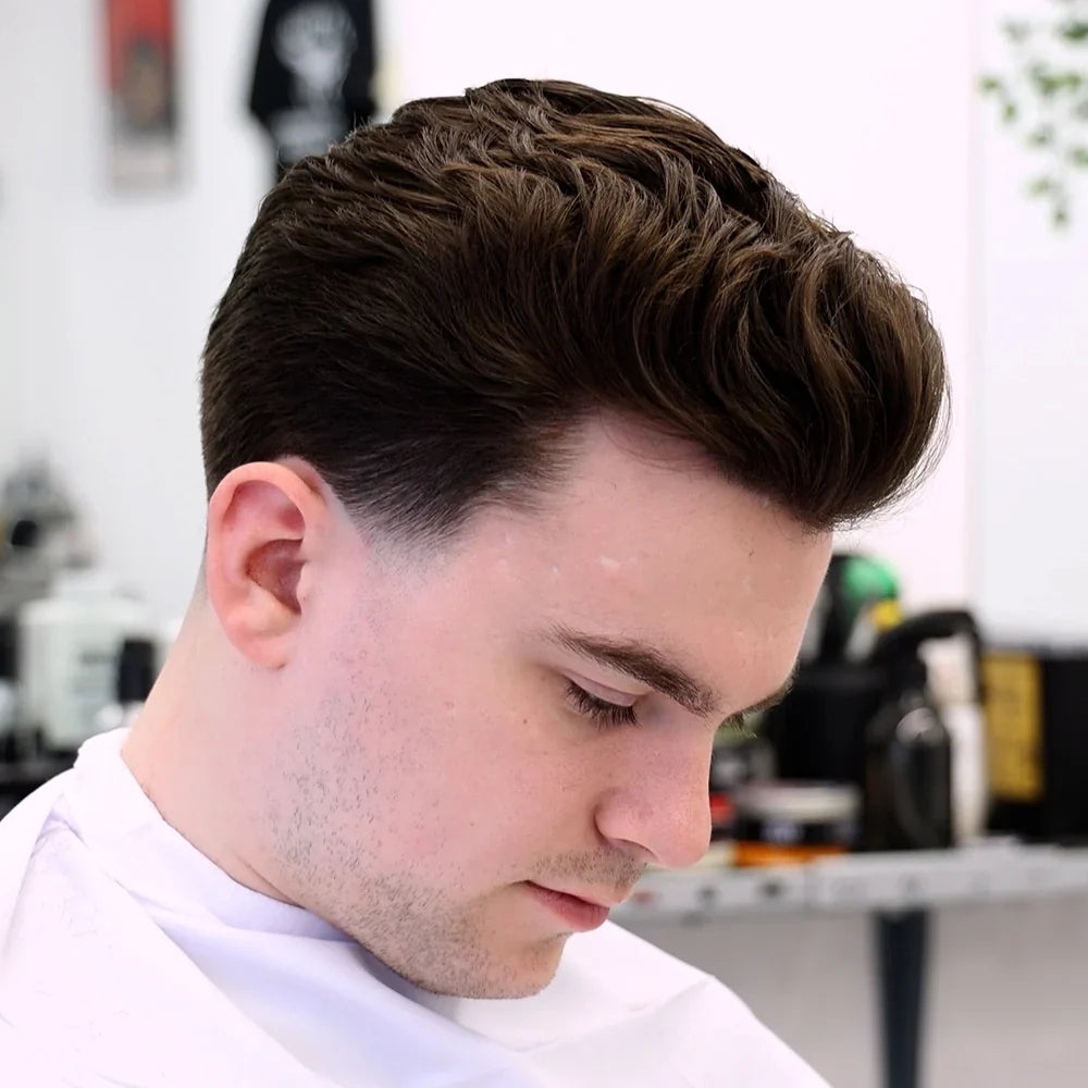 Man with a throwback with taper hairstyle