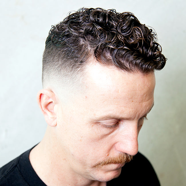 Defined Curls With a Fade Hairstyle